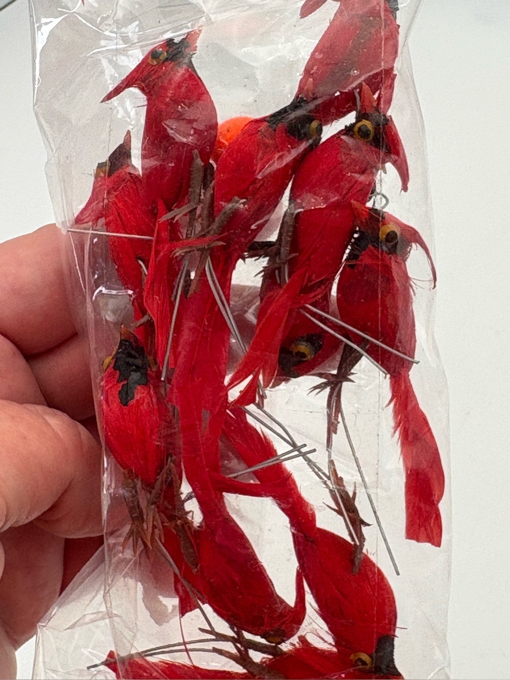11 Crafting Redbirds with Feathers and Metal Twist Connectors